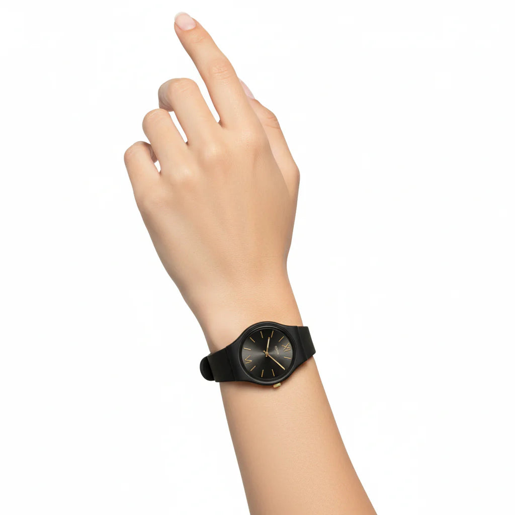 Montre Swatch Noire et Or : Élégance Minimaliste