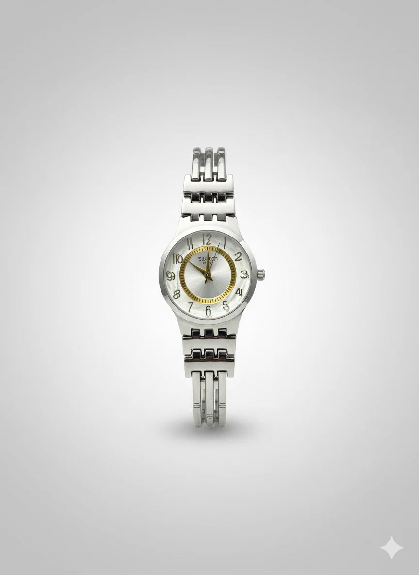 Montre Femme Swatch Argentée et Dorée avec Cristaux