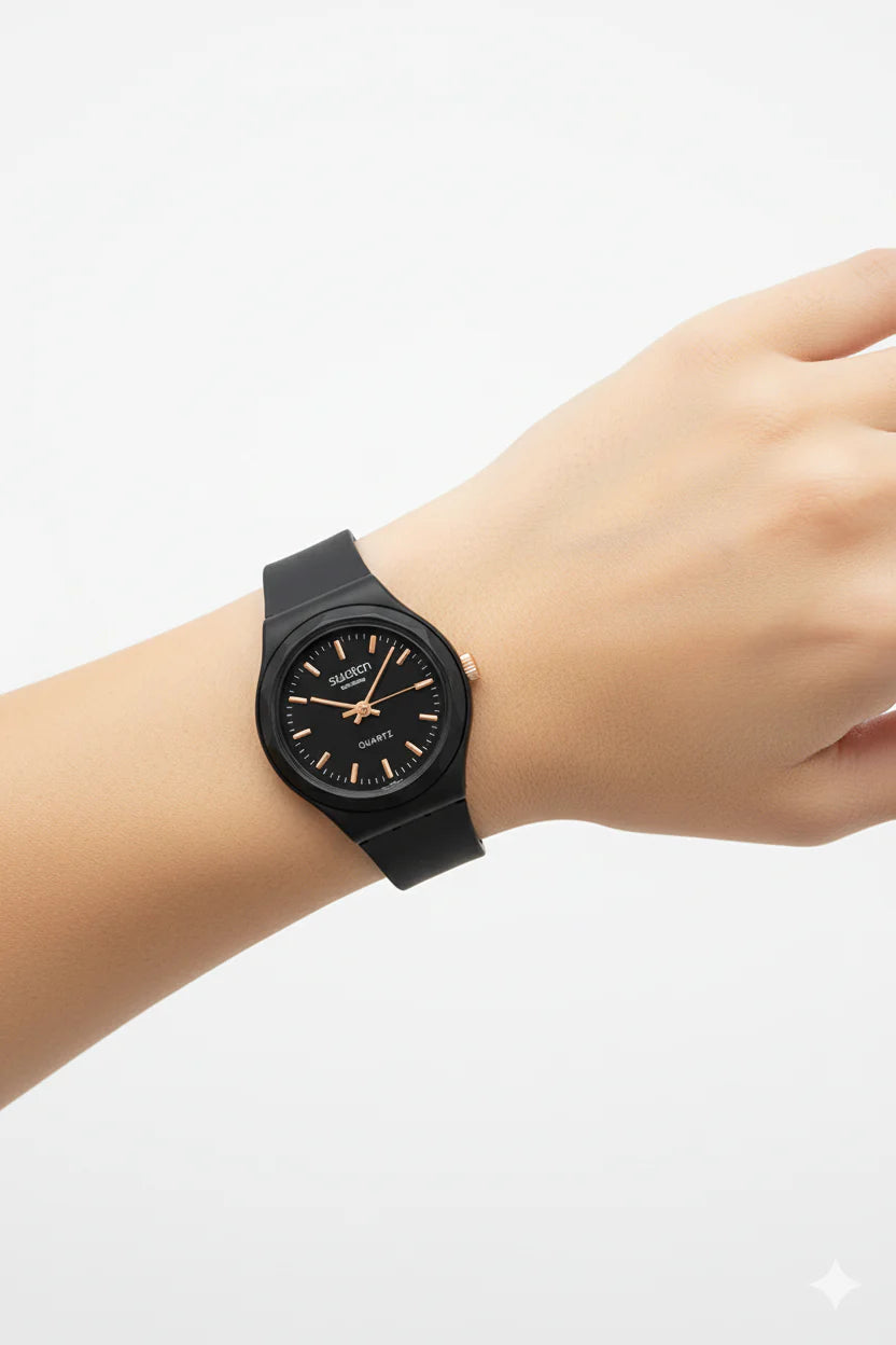 Montre Swatch Noire Mat &amp; Or Rose - L'Élégance Minimaliste